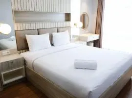 Nice and Relax 1BR at Grand Sungkono Lagoon Apartment By Travelio