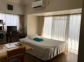 威克利港口景主楼公寓，位于那霸的公寓