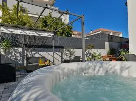 luxury apartment with garden jacuzzi and wellness