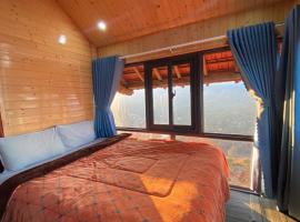 Săn Mây Homestay and Coffee Măng Đen，位于Kon Tum的山林小屋