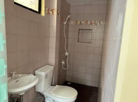 CasaLinda Homestay，位于Agoho的酒店