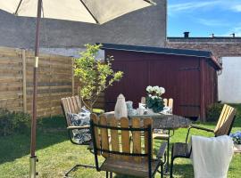 Centralt och mysigt boende i Tomelilla，位于图默利拉的酒店