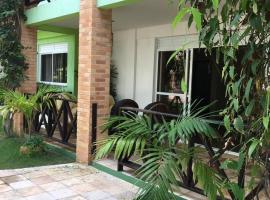 Condomínio Arituba Tropical - Praia Camurupim - Apartamento a 150m da praia，位于尼西亚弗洛雷斯塔的酒店