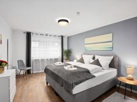 Haven Apartments Laupheim City WLAN Parkplatz Terrasse Balkon，位于劳普海姆的酒店