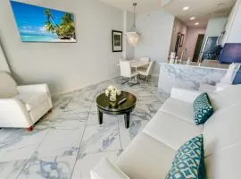 Coastal Escape Cozy 2BR w Shared Pools & Hot Tubs