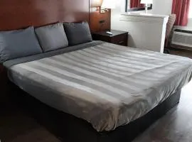 King Bed Hotel Suite 202