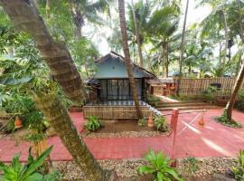 Palm Trees Ayurvedic Heritage，位于帕特南的酒店