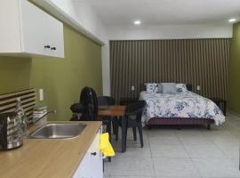 El Árbol Plaza Suites - Terra，位于迪坡斯特兰的酒店