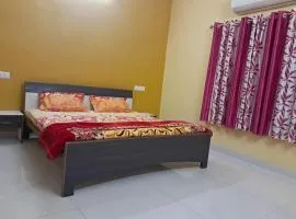 A C Room Near Devka Beach with Refrigerator,Microwave, RO Water