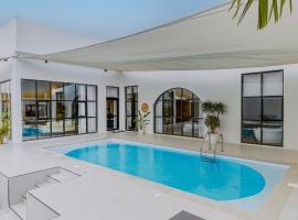 10 Pool Villa，位于拉斯阿尔卡麦的度假屋