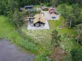 Luxushütte mit privatem Ufer