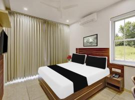 Super Townhouse Oak Dharwad formerly Rising Resort & Spa，位于Mugad的酒店
