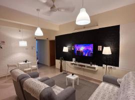 Electrifying 2 BHK Getaway，位于班加罗尔的酒店