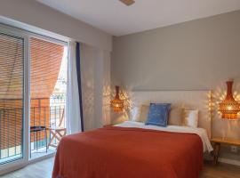 Hostal Boutique Es Portalet，位于桑特费柳德吉克索尔斯的民宿
