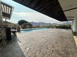 Casa campo en Cieneguilla 2,040m2，位于帕查卡马克的酒店