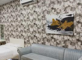 Fully Furnished Studio Apartment in Smart Umm Al Quwain，位于乌姆盖万的酒店