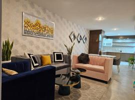 A2P Preciosa casa con habitación abajo en Acacia Residencial，位于库利亚坎的酒店
