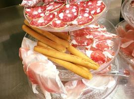 里斯特罗兰特比萨G.A.N酒店，位于卡夏的酒店