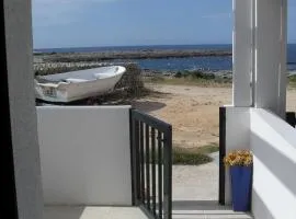 Charming fisherman's house in front of the sea