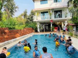 Salil Farm Nagaon Resort，位于阿利鲍格的酒店
