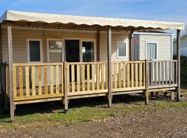 Location Mobilhome 3ch Mimizan Plage，位于米尼赞海滩的酒店