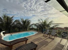 CASA 4QTOS PISCINA PRAIA，位于布希奥斯的酒店