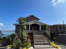 wind hill 全室オーシャンビューの素泊まりホテル，位于鸟羽的公寓式酒店