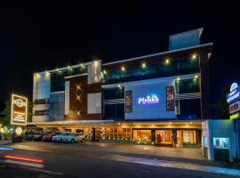 Hotel Malika Residency，位于Ettumānūr的酒店