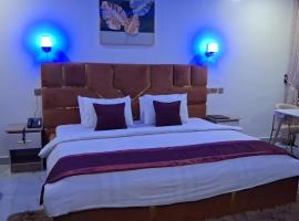 LINTOC HOTEL & SUITES，位于阿奴古的酒店