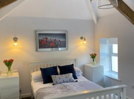 The Cottage, Bridge House，位于Laxey的酒店