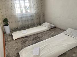Guest House Aitunuk，位于Kyzylemgek的酒店
