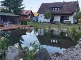 Ferienhaus mit Schwimmteich in idyllischer Lage