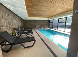 Depto a pasos de la playa, piscina, jacuzzi y patio，位于巴拉斯港的带泳池的酒店