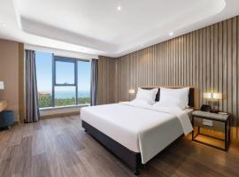 World Hotel Weihai International Bathing Beach Torch 8th Street Branch，位于威海的酒店