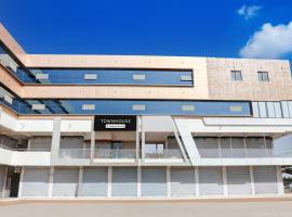 Super Townhouse Veraval Somnath Mandir Formerly Hotel The Grand Somnath，位于索姆纳特的酒店