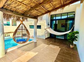 Casa de Playa en Antón Lizardo con alberca privada y club Playa，位于Alvarado的酒店