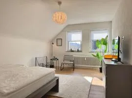 Gemütliches Dach-Apartment in der Stadt - ADAM -