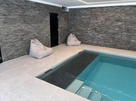 Le loft avec jacuzzi privatif - Domaine aux charmes d'Ethan，位于Hannut的酒店