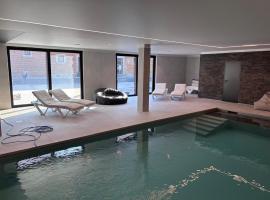 Family lodge - Domaine aux charmes d'Ethan，位于Hannut的酒店
