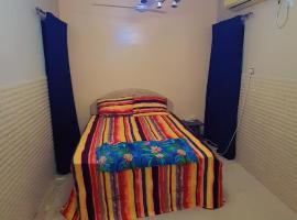 Fully Furnished bedroom with shared bathroom in a villa sharjah，位于沙迦的酒店
