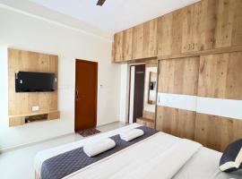 Sai Grand Villa Hotel Near Bangalore Airport，位于班加罗尔的酒店