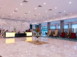 Palms by Eagles Airport City, Formerly Holiday Inn，位于阿克拉的酒店