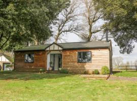 Holm Oaks Cottage，位于戈德尔明的酒店