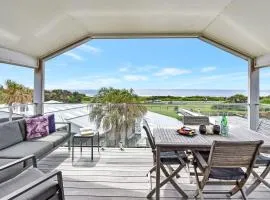 Whale Tales at Caves Beach Villas