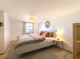 Skandi Lodge mit Seesicht nahe Interlaken，位于莱西根的酒店