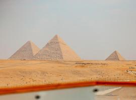 Sultan Pyramids Boutique Hotel View，位于埃兹贝特的带停车场的酒店