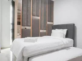 Nice and Comfort 1BR at Citralake Suites Apartment By Travelio
