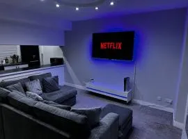 Modern 3-Bedroom Home with Cozy Cinema-Style Living Space