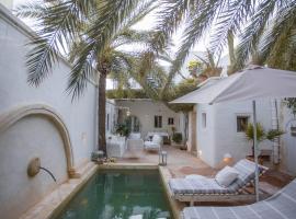 La Maison Blanche -Les Houchs De Djerba，位于伊里德的酒店