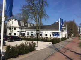 费吕沃森林弗莱切酒店，位于贝克贝亨的酒店